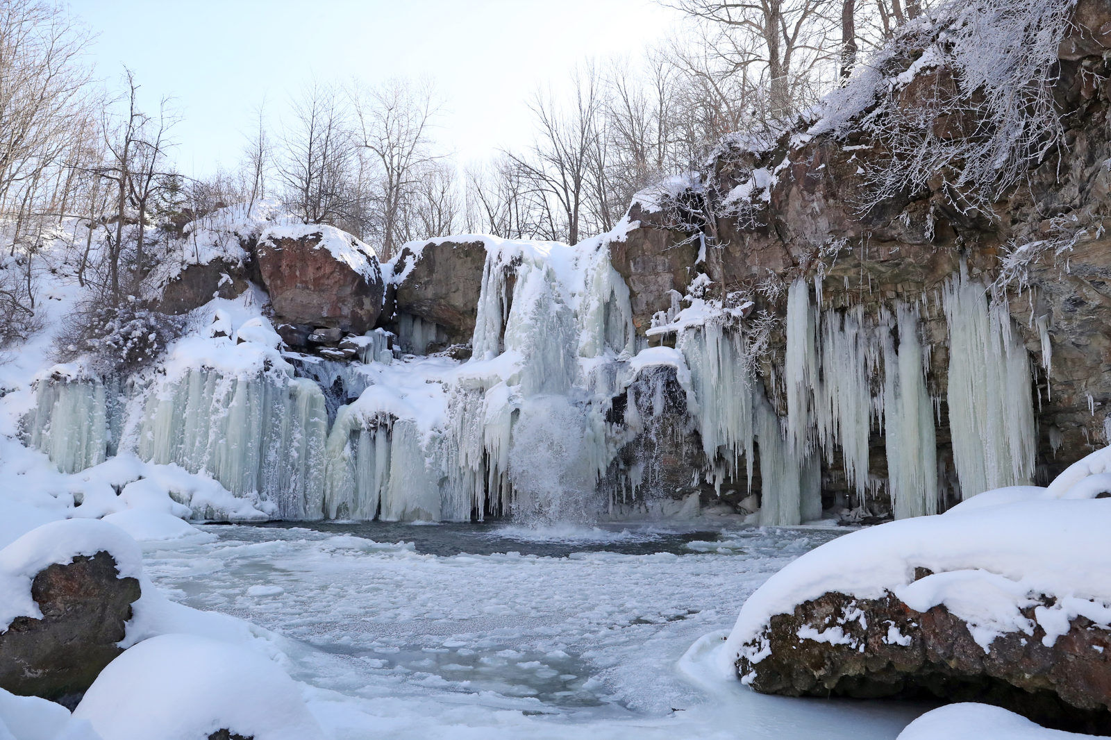 Ice forms on the the 40-foot waterfall on Murder Creek in Akron Falls Park